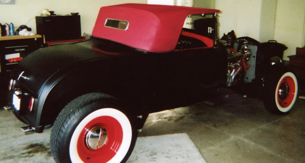 Photo of Carl's Shell Valley roadster from behind.